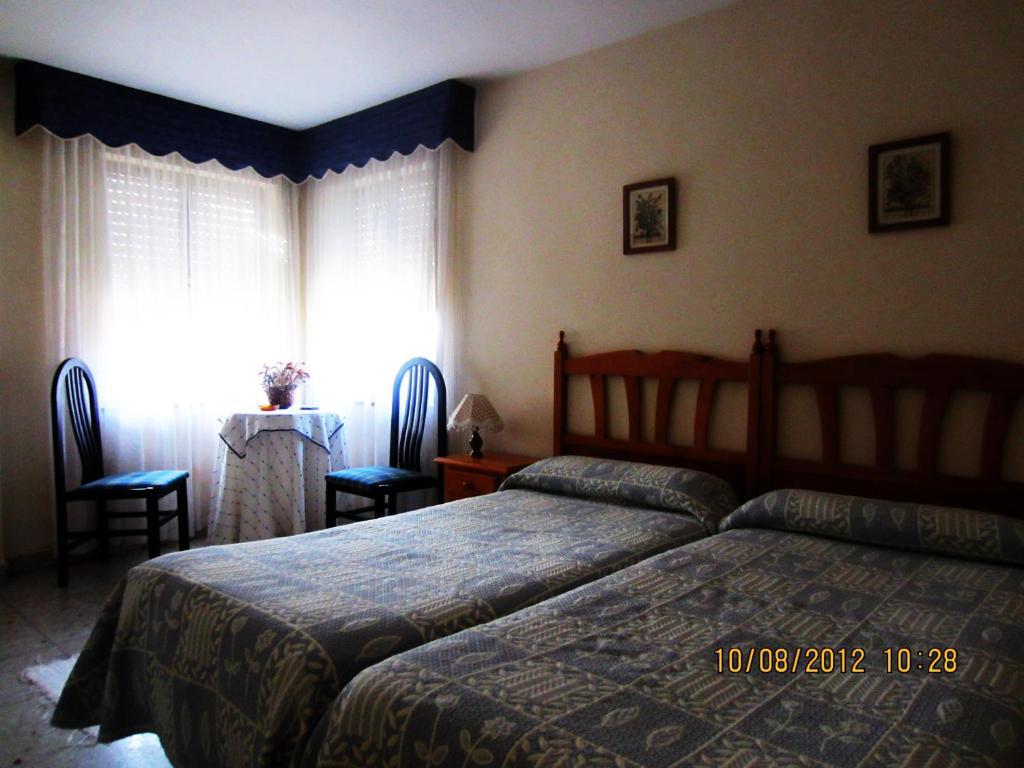 Hotel Toscana Ojedo Quarto foto